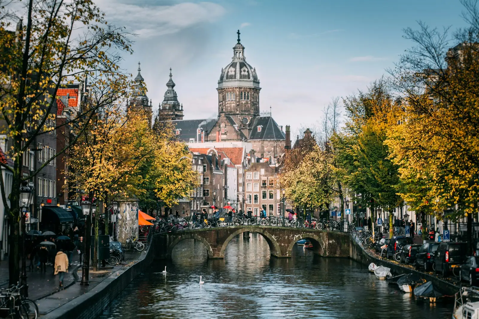 Amsterdam canal with beautiful architecture and trees