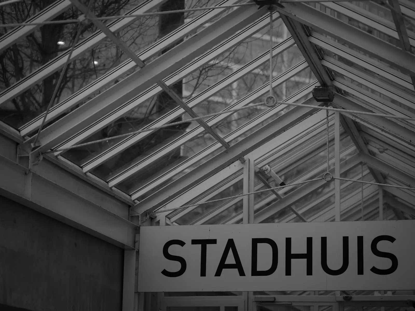 A black and white photo of a stadium sign