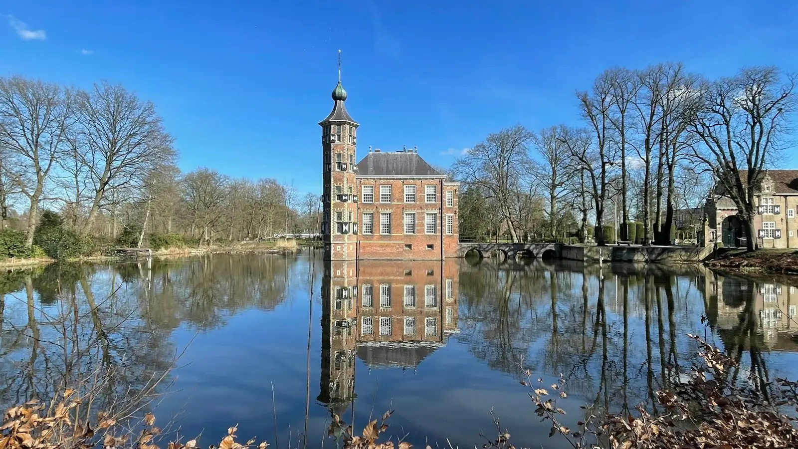 A large building sitting next to a body of water