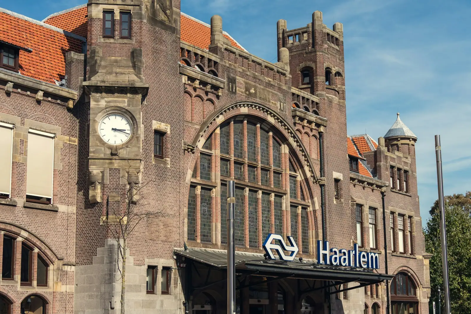 A large building with a clock on the front of it
