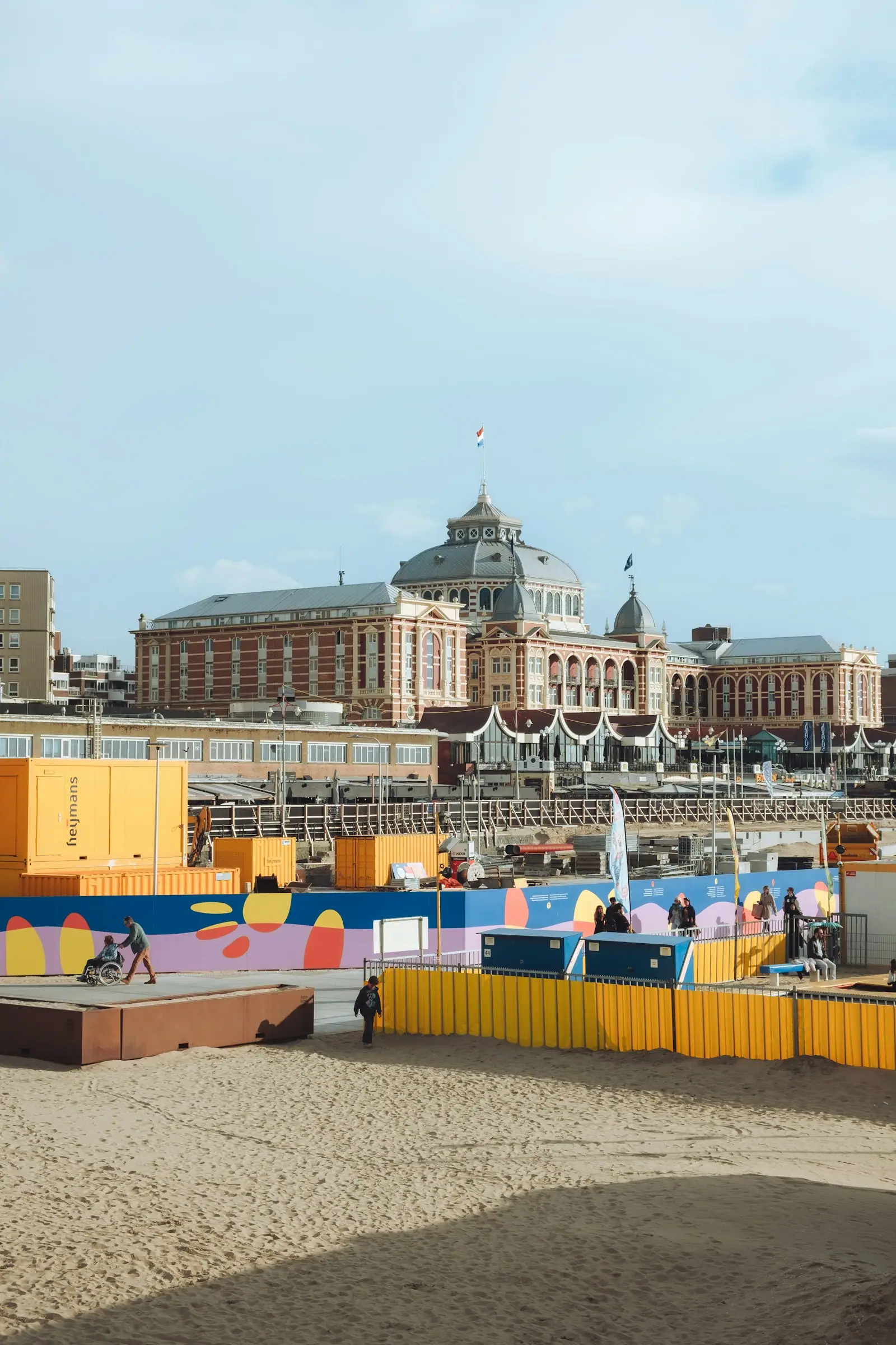 A beach area with a building in the background