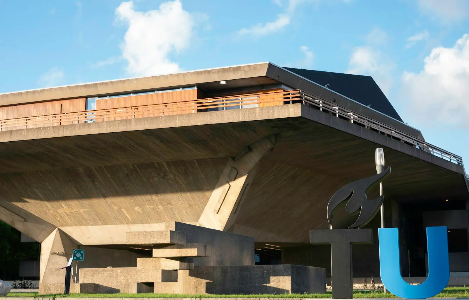 Brown concrete building under blue sky during daytime