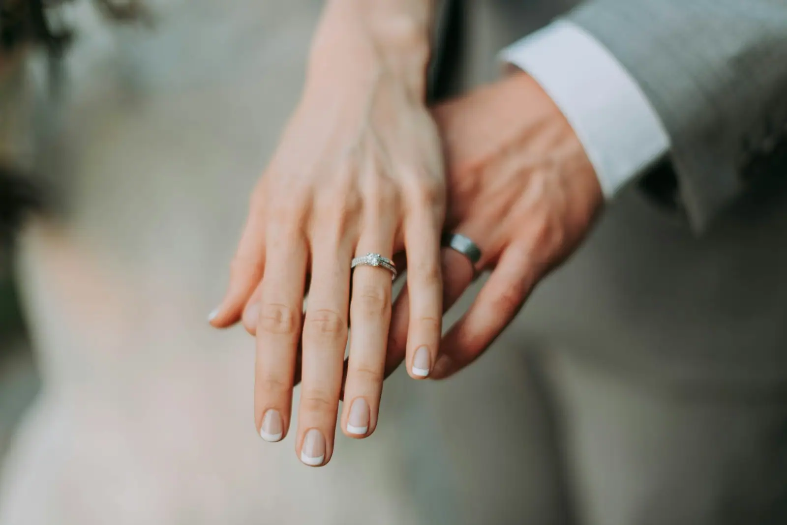 Woman touch man's hand