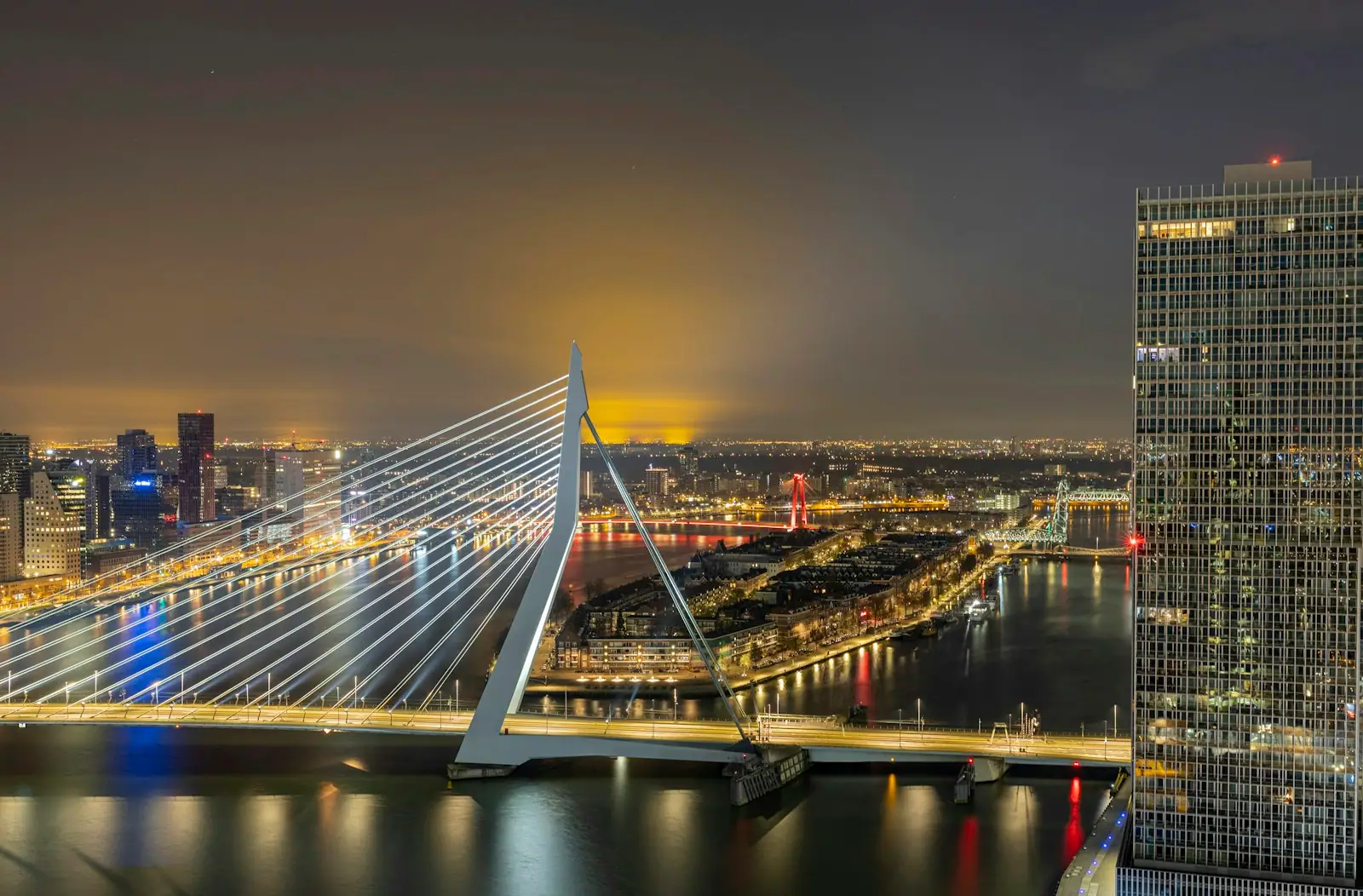 Bridge over water during night time