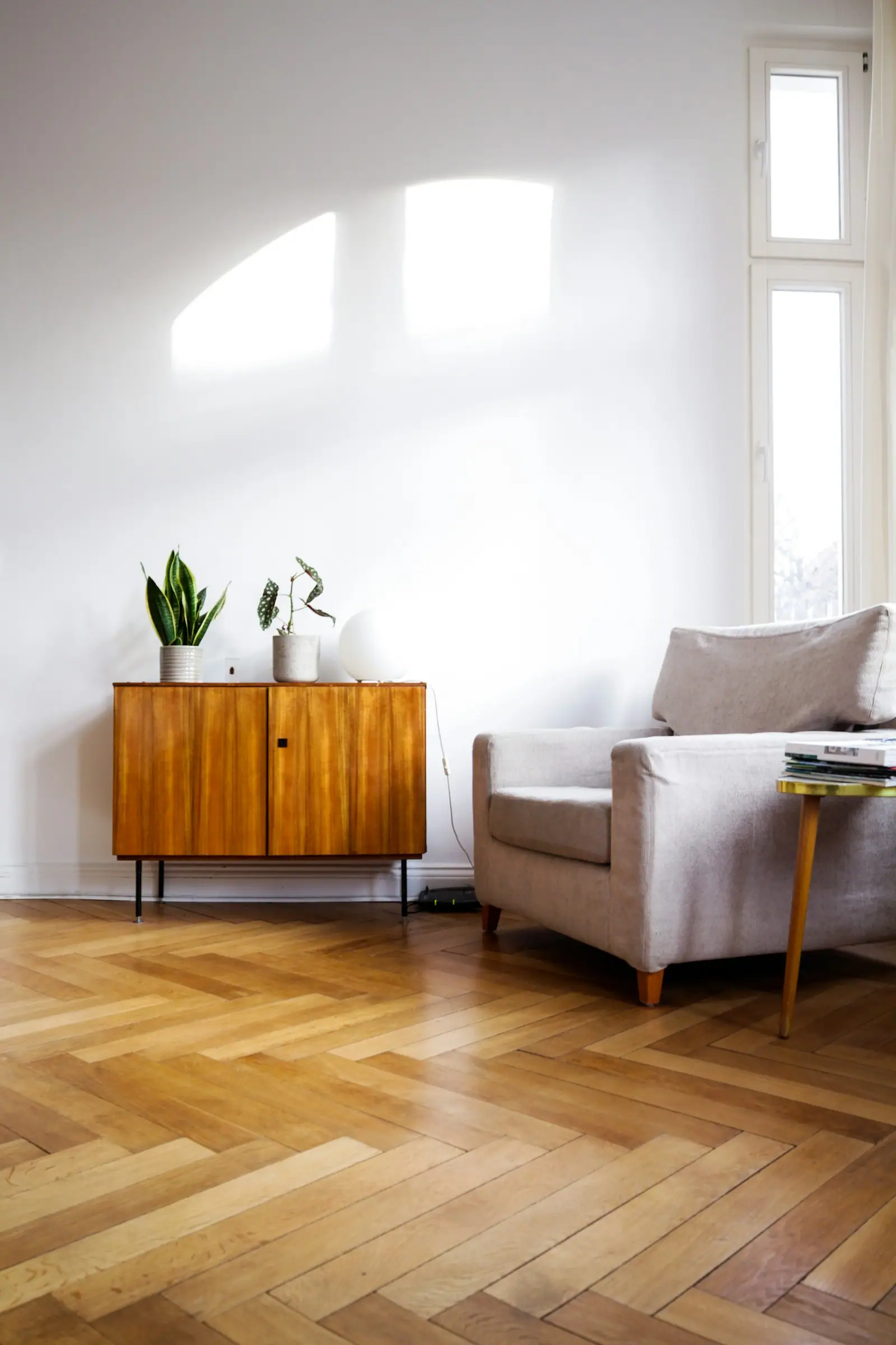 Minimalist living room with wooden sideboard