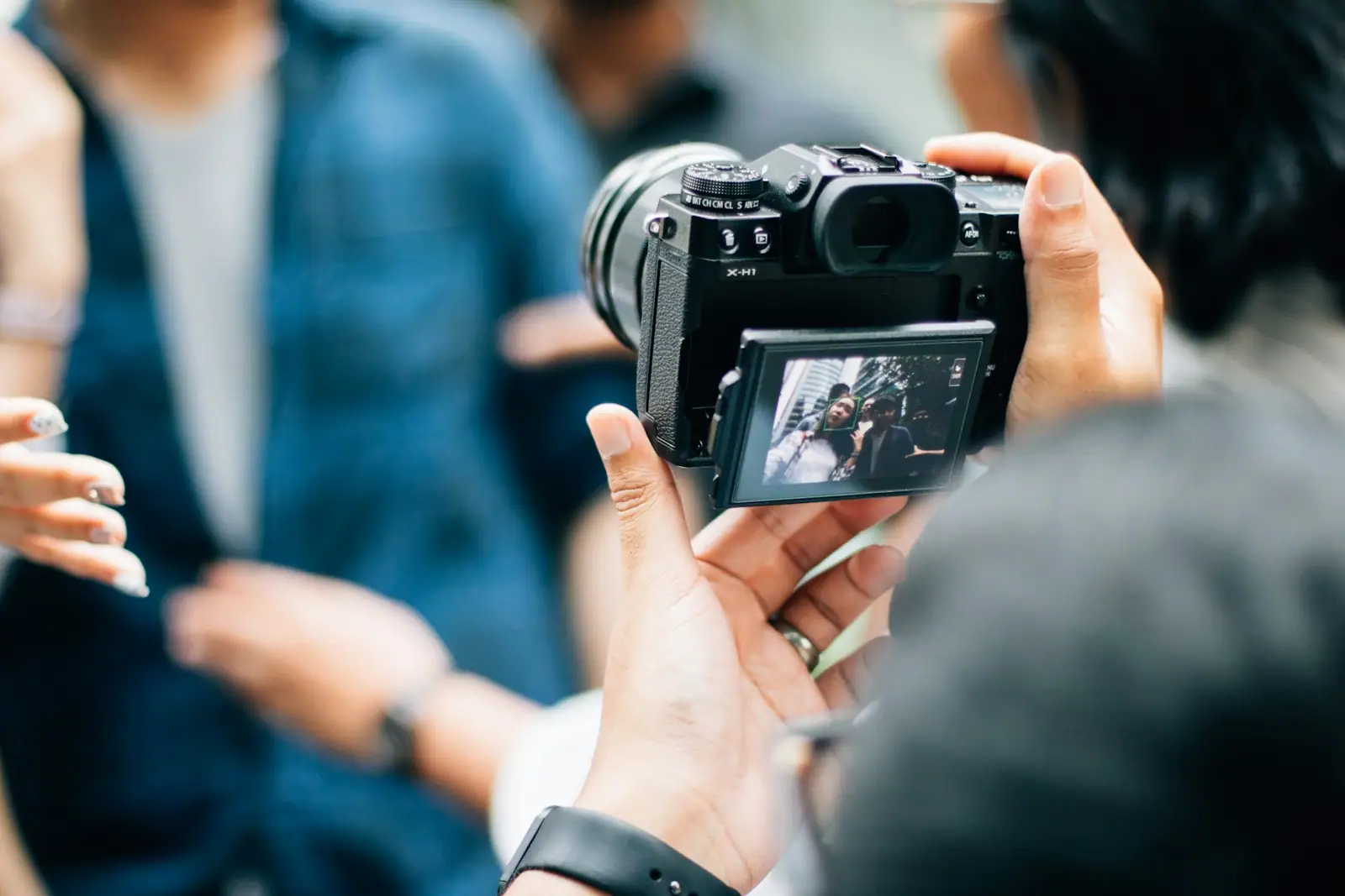 Person holding camera