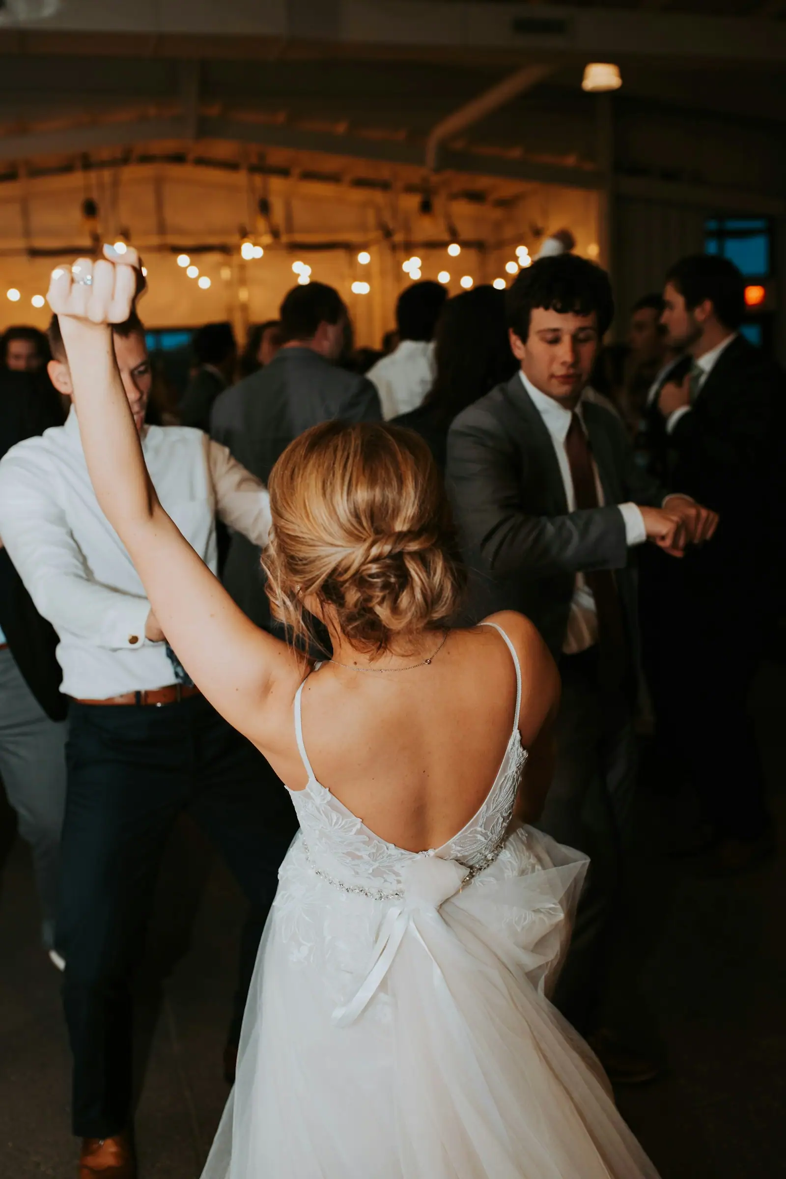 A bride and groom dancing at their wedding reception